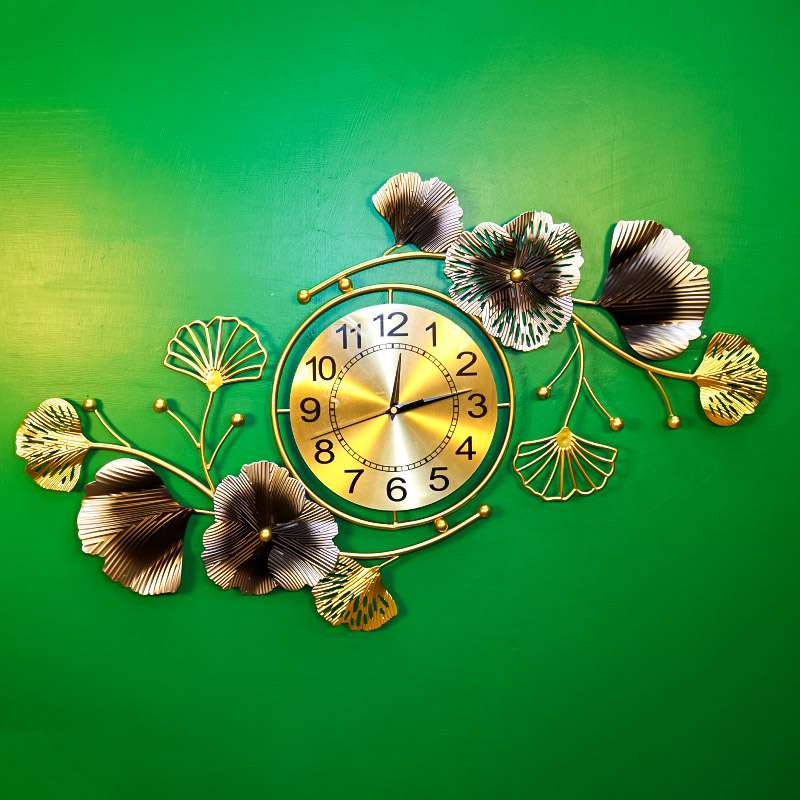 Golden black luxury wall clock with ginkgo keaves